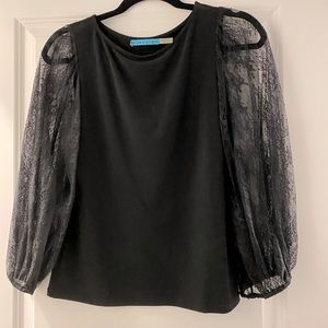 Black top with lace sleeves. Alive and Olive